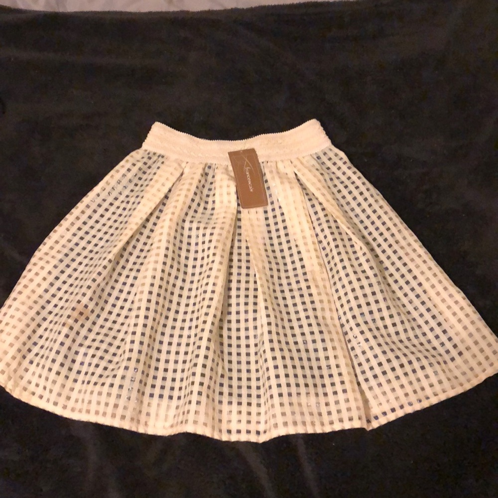 Beige skirt.